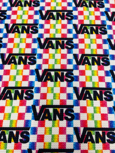 Vans on Rainbow Checkered Background